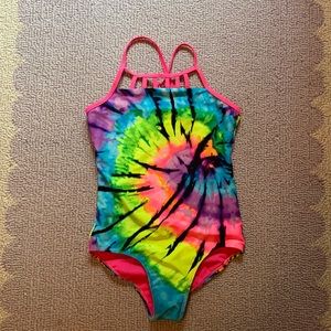 Justice rainbow tie dye one piece swim suit.